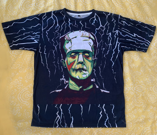 You Will Get noticed with UNIQUE CENTRIC BY SHAKINAART FINE ART Frankenstein Monster T-Shirt! Perfect for horror movie enthusiasts, this eye-catching design INSPIRED BY BORIS KARLOFF is a must-have. Stand out from the crowd, and turn heads. GOTH KINGS Shop now!