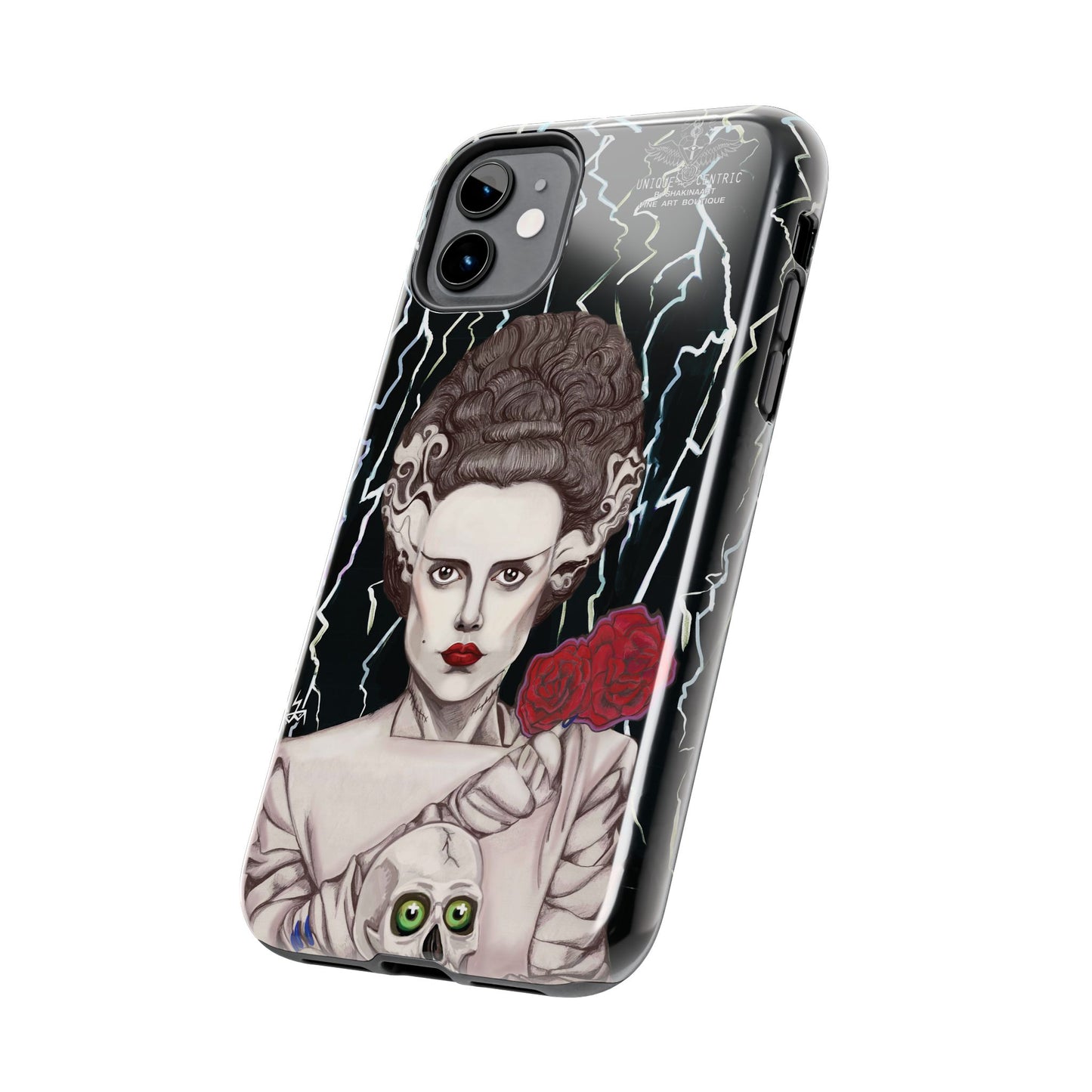 ELECTRIFY Those Around You with A Bride even the LIVING can be Bewitched By.... Let Them Stare at a Tough Phone Case that will Protect Your iPHONE Wherever GO!  Inspired by Universal Studios 1935 Film, The Bride of Frankenstein, starring Elsa Lanchester.   The Corpse Bride of Frankenstein was originally Brought to Life on Canson Paper, via the Mediums of Pen, Marker, Colored Pencil, and Acrylic Paint, by the then Blossoming Artistic Talent of Shakinaart when She was 16 years old.  SHAKINAART's Paintings are