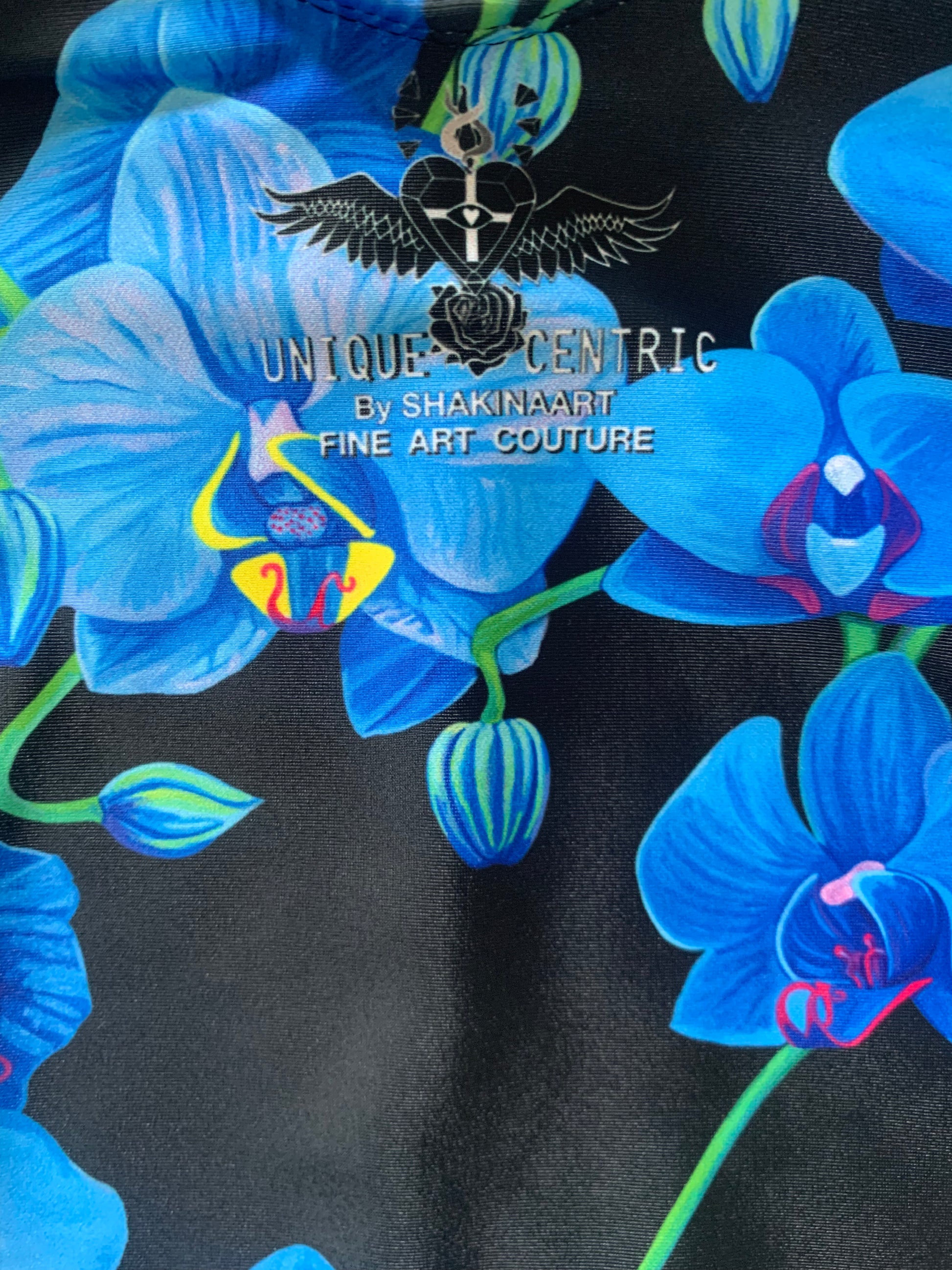 Dive into Summer with confidence & make a splash in this chic & stunningly gorgeous blue orchid one piece swimsuit. A great addition to your designer swimwear collection. Be Unique & Fabulous, while Embracing botanical elegance, beauty, grace and style at the pool party & beach! by SHAKINAART