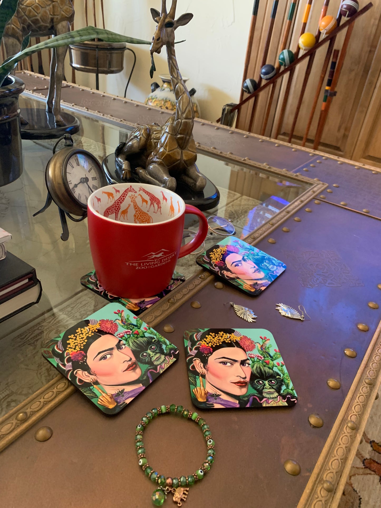 Frida Kahlo posing with her pet monkey, showcasing her unique bond with animals. shakinaart fine art drink coasters pablo picasso hand of living god earrings hummingbird flowers crown opuntia cactus Frida Kahlo with her pet monkey on her shoulder. Portrait of Mexican Frida Kahlo with her beloved monkey  diego rivera opera Perfect for protecting surfaces from drink spills.